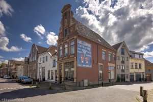 Muurreclame Kanis en Gunninks koffie en thee